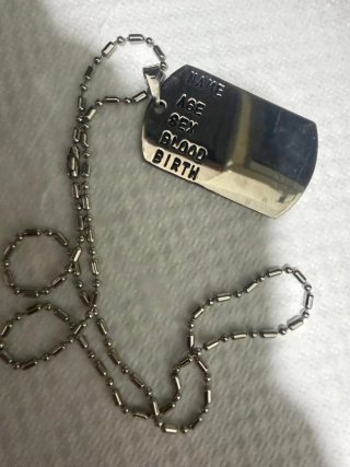 Collana con medaglietta militare