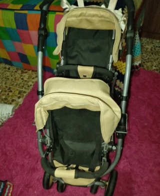 Cochecito doble para muñecos con accesorios
