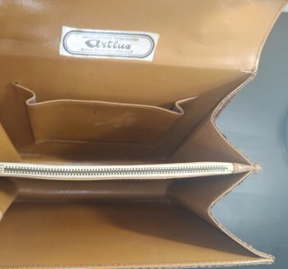 Bolso de piel serpiente marrón y dorado