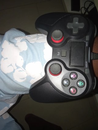 Mando de consola negro