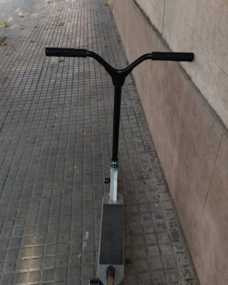 Patinete freestyle plateado