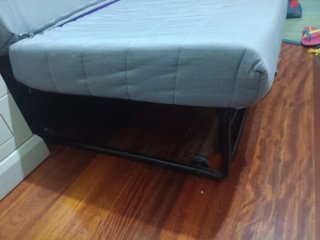 Sillón cama tela gris y turquesa