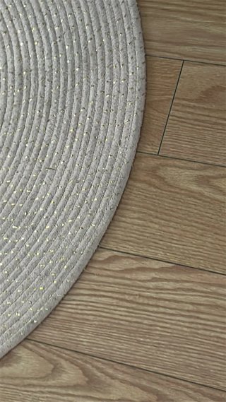 Alfombra redonda beige y dorada