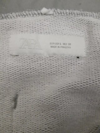 Pantalón acampanado Zara gris