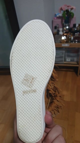 Botines de piel con flecos