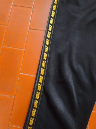 Pantaloni tuta Nike uomo nero oro taglia S