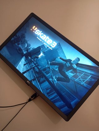 Consola PS3 con 5 juegos y mando
