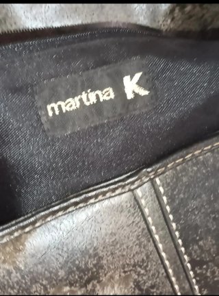 Bolso gris amplio efecto piel sin desperfectos