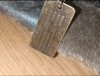 Bolso gris amplio efecto piel sin desperfectos