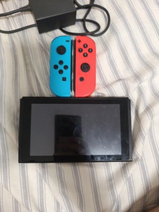 Nintendo Switch (Azul/Rojo) - Carga Rota