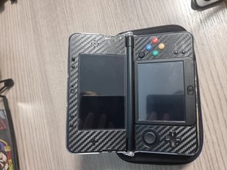 New 3DS con funda protectora