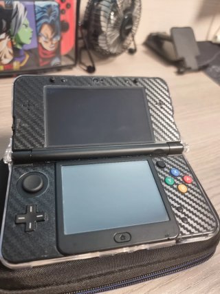 New 3DS con funda protectora