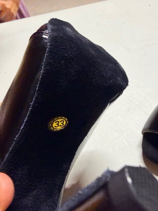 Botines de tacón aguja con cordones