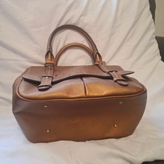 Bolso Carolina Herrera dorado