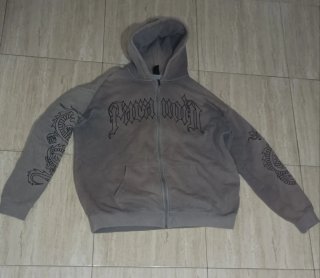 Sudadera con cremallera y dragones