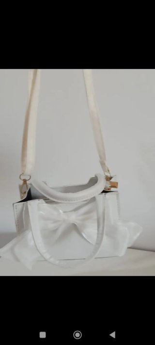 Bolso blanco con lazo