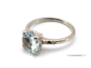 sortija oro 18k con piedra con topacio