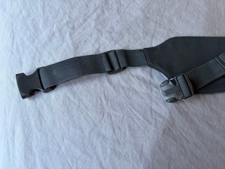 Riñonera deportiva negra con bolsillo transparente