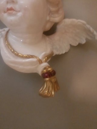 Cabeza de ángel de porcelana