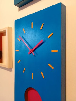 Orologio da parete pendolo blu e fucsia