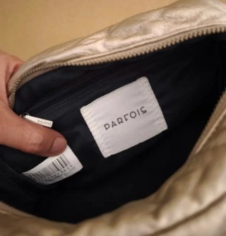 Parfois Bolso bandolera puffer acolchado dorado