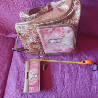 Conjunto mochila y billetero nuevo