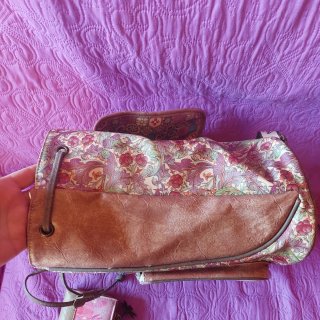 Conjunto mochila y billetero nuevo