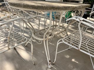 Conjunto comedor jardín piedra y hierro forjado