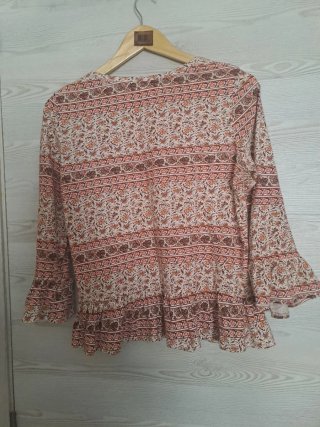 Blusa estampada manga larga
