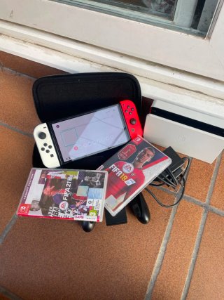 Nintendo Switch OLED + FONDINA + GIOCHI