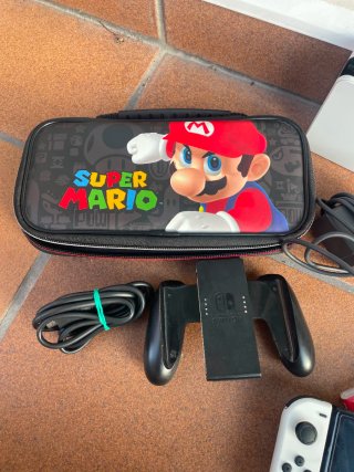 Nintendo Switch OLED + FONDINA + GIOCHI