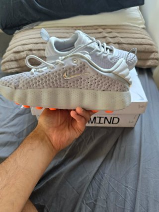Zapatillas Nike mind 002 Grises y Naranja