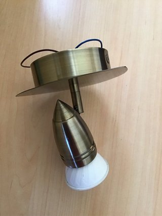 Foco de pared dorado