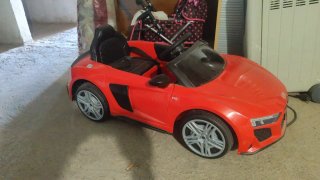 Coche eléctrico infantil rojo