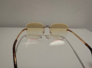 Gafas de sol Chanel doradas y naranjas