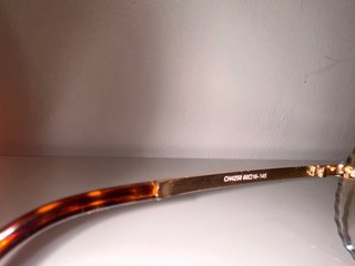 Gafas de sol Chanel doradas y naranjas