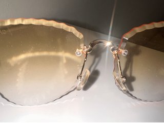 Gafas de sol Chanel doradas y naranjas