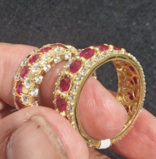 Alianzas Oro 18kt con Circonitas Rojas