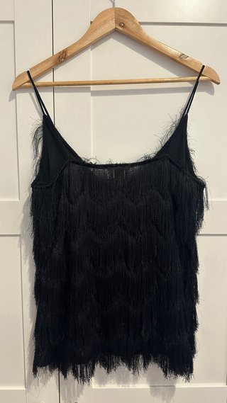 Top H&M negro con flecos