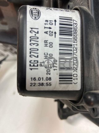 Opel astra H berlina faro del izqd ref 1EG27037021