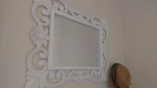 Espejo decorativo blanco con marco tallado