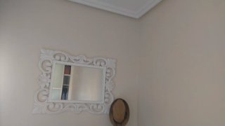 Espejo decorativo blanco con marco tallado