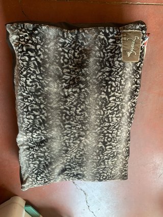 Cama para perro con estampado animal