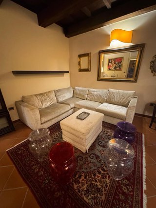Sofá modular Flexform Magnum y pouf