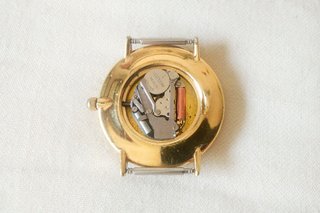 reloj Justina dorado