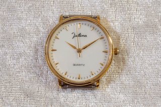 reloj Justina dorado