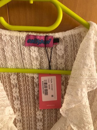 Blusa de encaje blanca manga larga