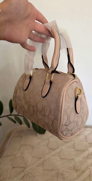 Bolso Coach brillante con pedrería