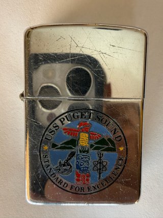 Lote 2 Zippos y funda de cuero