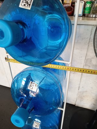 Estantería para 4 garrafas de agua + bidones